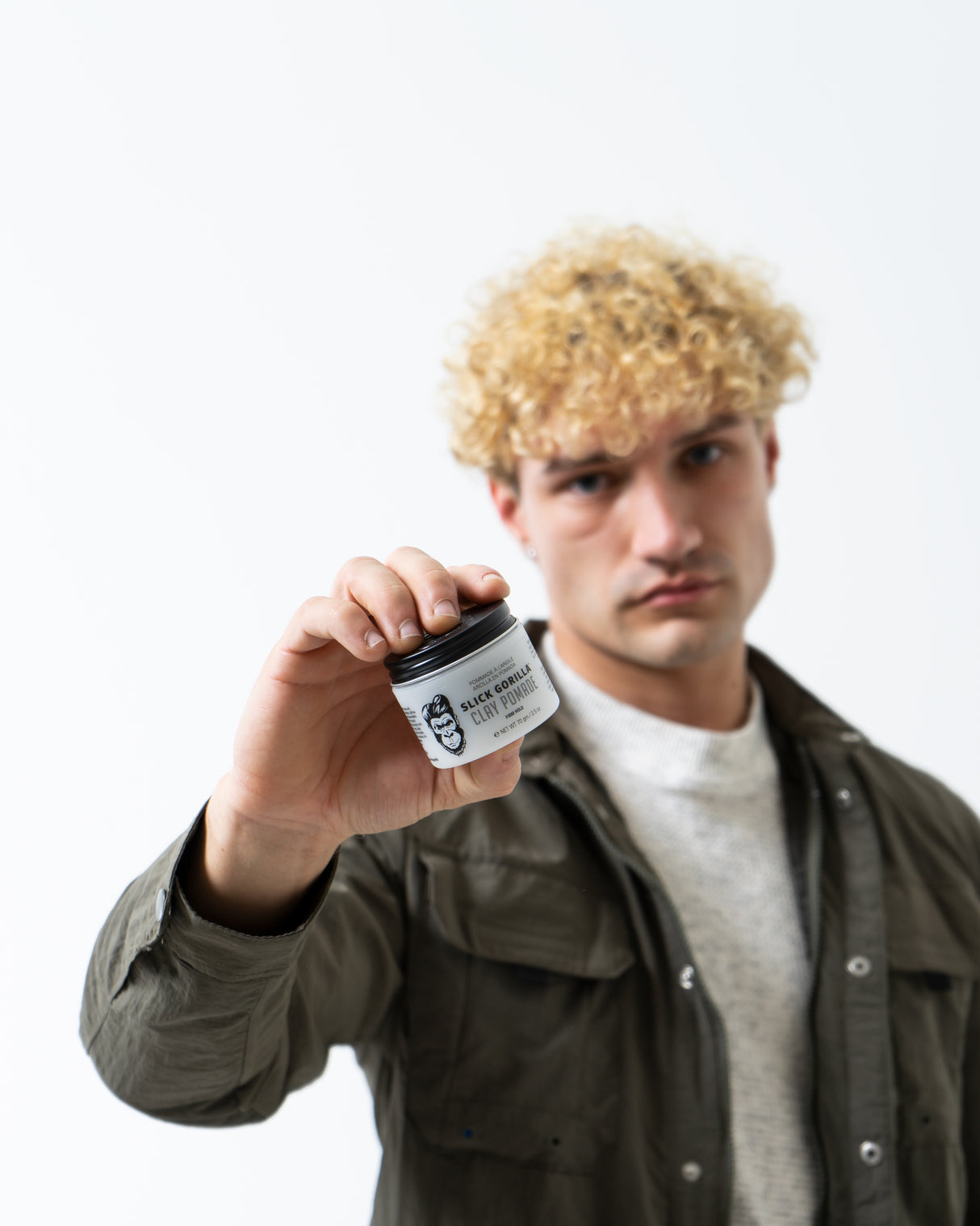 Slick Gorilla Clay Pomade 70 g man with curly hair