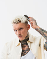 Slick Gorilla Texture Comb man using the comb